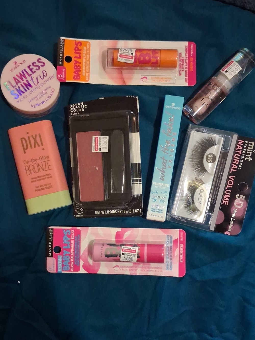 8 NWT ITEMS, PIXI,ESSENCE,MINT .Maybelline ETC. RETAIL $125.00. ALL NAME BRAND.